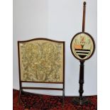 A Victorian pole screen with Barber crest and an early 20th century fire screen (2)