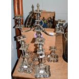 A quantity of various silver plated table wares, including candelabra, trays, tea and coffee pots,