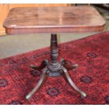 A Regency mahogany snap top centre pedestal occasional table with rectangular top, with ring