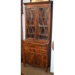 A 19th century mahogany glazed bookcase cabinet, 76cm by 42cm by 190cm