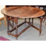 An 18th century double gateleg table, 143cm by 120cm by 75cm