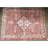 Shirvan Rug, the diamond lattice field with stepped medallion framed by leaf and calyx borders,