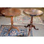 A George III oak snap top tripod table, rotating on a bird cage mechanism, 58cm diameter by 70cm,