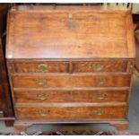 A George III oak bureau, 109cm by 53cm by 113cm