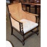 A Victorian mahogany upholstered chaise longue, together with a circa 1920's bergere armchair (2)