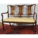 A late Victorian mahogany inlaid open sofaIn good condition throughout. With the usual minor