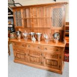 MSH Bespoke Designs Ltd (formerly Kimberly furniture Ltd) A solid oak and leaded dresser, 168cm by
