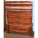 A Victorian mahogany Scottish chest of drawers, the large scroll fronted top drawer fitted with
