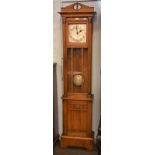 An Art Deco oak longcase clock, 11.5'' silvered Arabic numeral dial, 201cm high