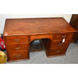 A Victorian mahogany kneehole desk with pine top, 125cm by 53cm by 67cm