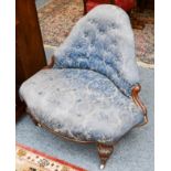 A Victorian walnut framed button upholstered section of a conversation seat