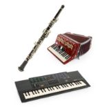 Oboe stamped 'J. R. Lafleur & Sons Ltd' no.8811 (cased) together with Accordion by Parrot 72