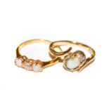 An opal and diamond three stone ring, stamped ‘22CT’, finger size M; and an opal and diamond ring,