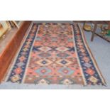 Kashgai kilim, the field of polychrome bands of geometric motifs enclosed by reciprocal borders,