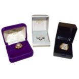An 18 carat gold imitation diamond solitaire ring, finger size R1/2; two 9 carat gold imitation