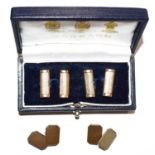 A pair of Elizabeth II 9 carat gold cufflinks; and a pair of silver cufflinksCondition report: 9