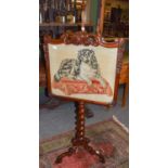 A Victorian mahogany polescreen with barley twist upright and needlework panel depicting a