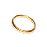 A 22 carat gold band ring, finger size JCondition report: Gross weight 3.9 grams.
