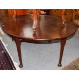 A George III mahogany gateleg dining table, 150cm by 135cm (open) by 71cm