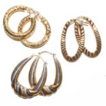 Three pairs of hoop earrings, varying designs