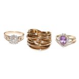 A 9 carat gold diamond cluster ring, finger size N; a 9 carat gold amethyst and diamond cluster