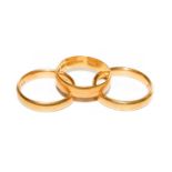 Three 22 carat gold band rings, finger sizes P, P1/2 and Q1/2Condition report: Gross weight 16.0