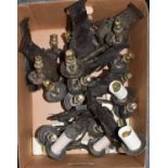 A set of nine early 20th century patinated metal twin branch wall lights (one box)