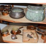 A 19th century copper cauldron with iron loop handles, a Middle Eastern copper vessel, herb cutter