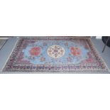 Isparta rug of Kashgar design, the sky blue field with three roundels enclosed by indigo borders,