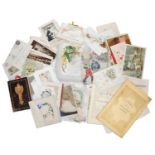A shoebox containing a selection of late Victorian greeting cards and two early souvenir booklets of