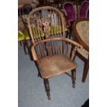 A 19th century Elm & Yew wood Windsor arm chair with crinoline stretcherCondition report: Stretchers