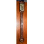 An early 19th century mahogany stick barometer, signed M. Pedragly of Rochdale (af)