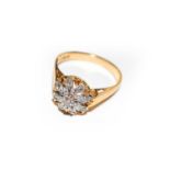 An 18 carat gold diamond cluster ring, finger size NCondition report: The ring is in good condition.