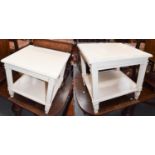 A pair of modern painted hardwood lamp tables raised on square supports and with under tier, 60cm