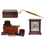 A mahogany mantel clock striking on two gongs; a rosewood work box, a mahogany travelling box;