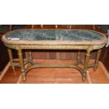 A Louis XVI style marble topped carved giltwood coffee table, the fluted legs joined by shaped