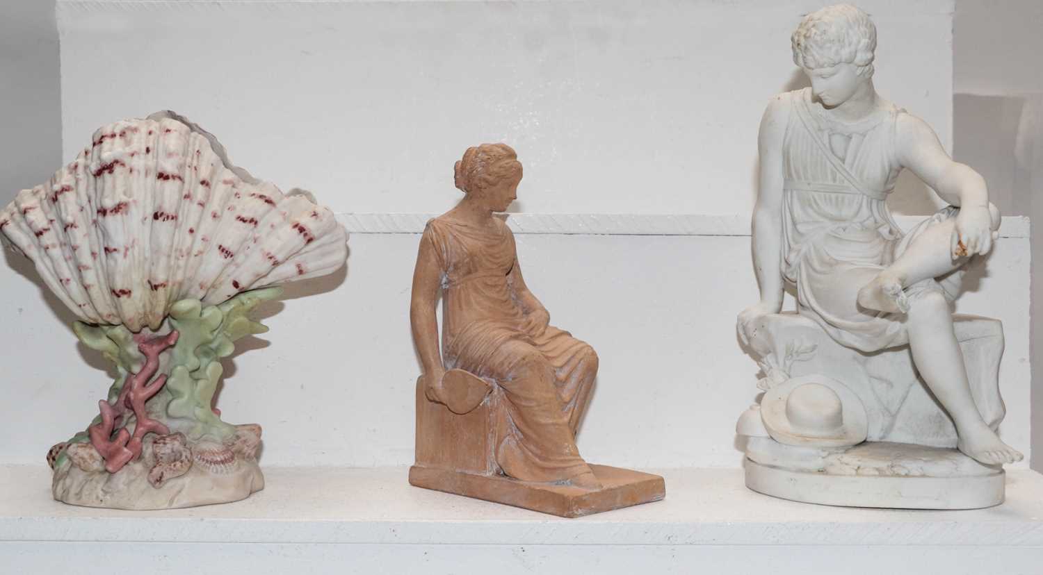 A 19th century Parian figure in Sevres style, study of a seated Roman boy, together with a