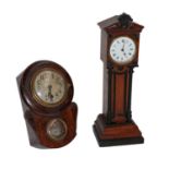 An oak cased mantel timepiece formed as a miniature longcase clock and with ebonised mouldings;