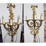 A Pair of 20th century gilt brass three-light wall sconces, cast with oak leaves, acorns, and