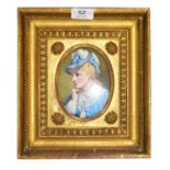 An early 20th century watercolour portrait miniature depicting a lady in blue, and in gilt frame