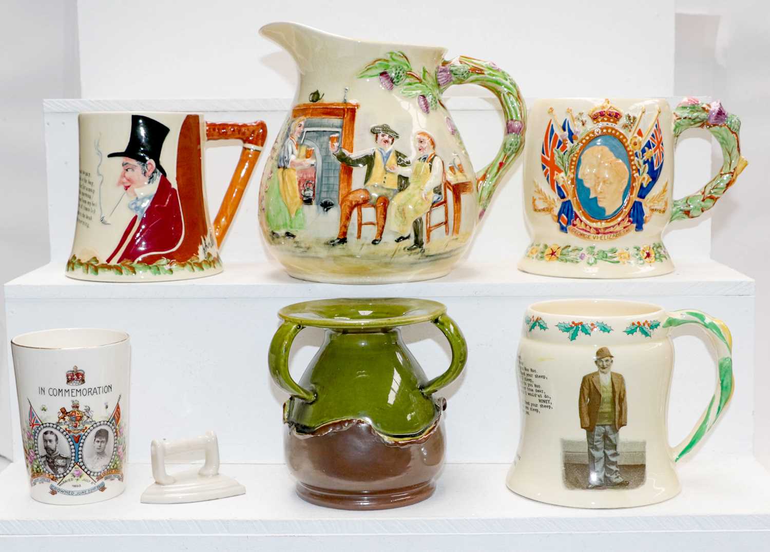 A quantity of Crown Devon musical pottery items including Auld Lang Syne jug, John Peel, George VI