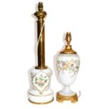 An opaque glass and gilt metal mounted tablelamp of baluster form enamelled with flowers together