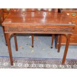 A Chippendale style mahogany fold over table