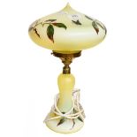 A frosted Vaseline glass table lamp and shade decorated with fruiting branches and butterflies, 38cm