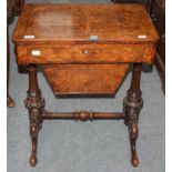 A Victorian burr walnut work table, quarter veneered, inlaid and raised on reeded supports, 58cm