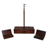 A pair of Georgian brass and mahogany scales, with single drawer, including various weights;
