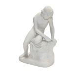 A 19th century Parian sculpture of Narcissus, possibly Copeland, 31.5cm, together with a Parian