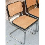 A set of six mid 20th century ebonised and caned cantilever chairs with chrome basesCondition