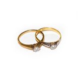 A 9 carat gold diamond solitaire ring, finger size P; and another diamond solitaire ring, stamped ‘