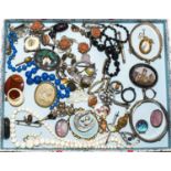 A quantity of jewellery including a silver bangle, various brooches, necklaces and earrings